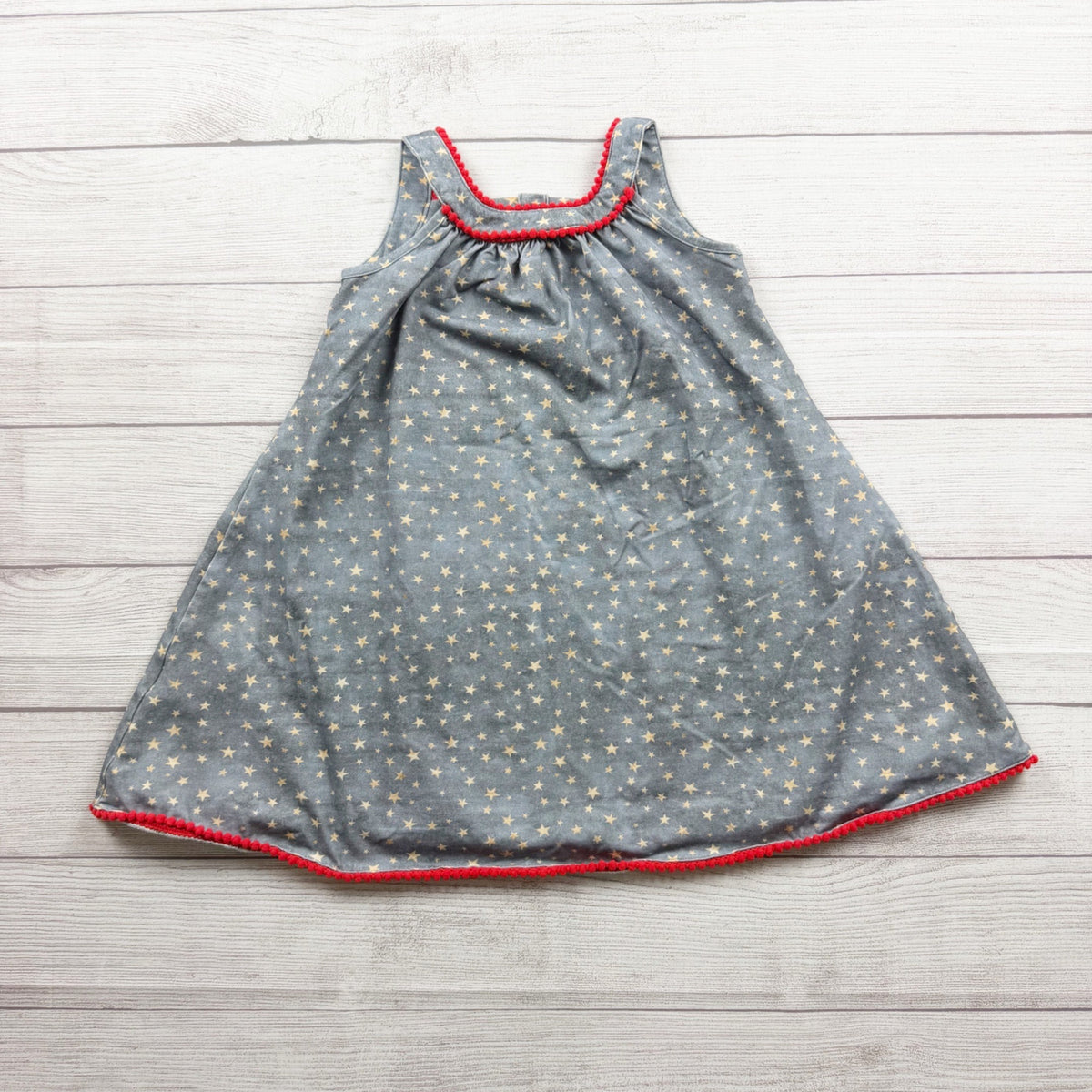 Cheeky Plum Star Print Sleeveless Girls Dress Red Pom Trim 6